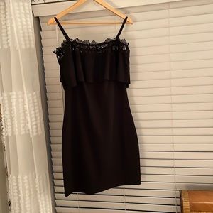 Black bodycon with lace and ruffle